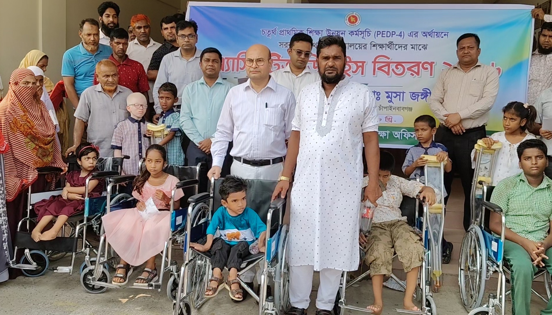 শিবগঞ্জে ভূমিসেবা বিষয়ক গণশুনানি, লিচুর চারা রোপণ ও হুইল চেয়ার বিতরণ
